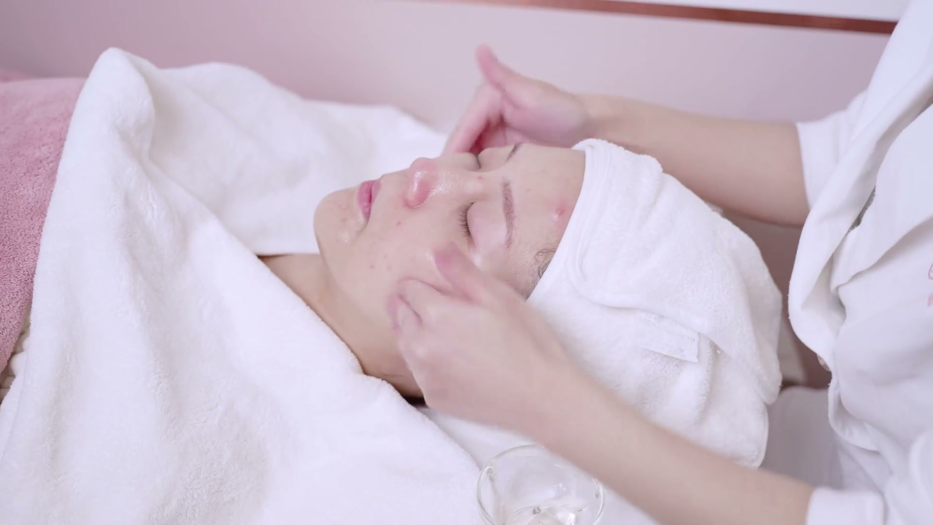 Facial massage in progress